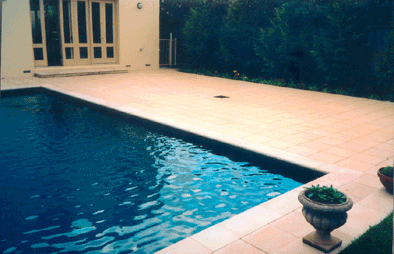 Natural Stone or Brick Pavers Work Great with Swimming Pools